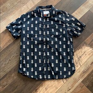 Men’s denim and flower button up shirt.